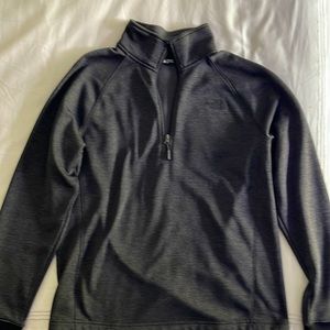 Men’s North Face quarter zip in dark gray.